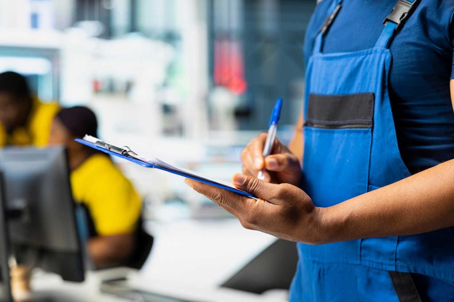 Inspector testing fire safety system compliance